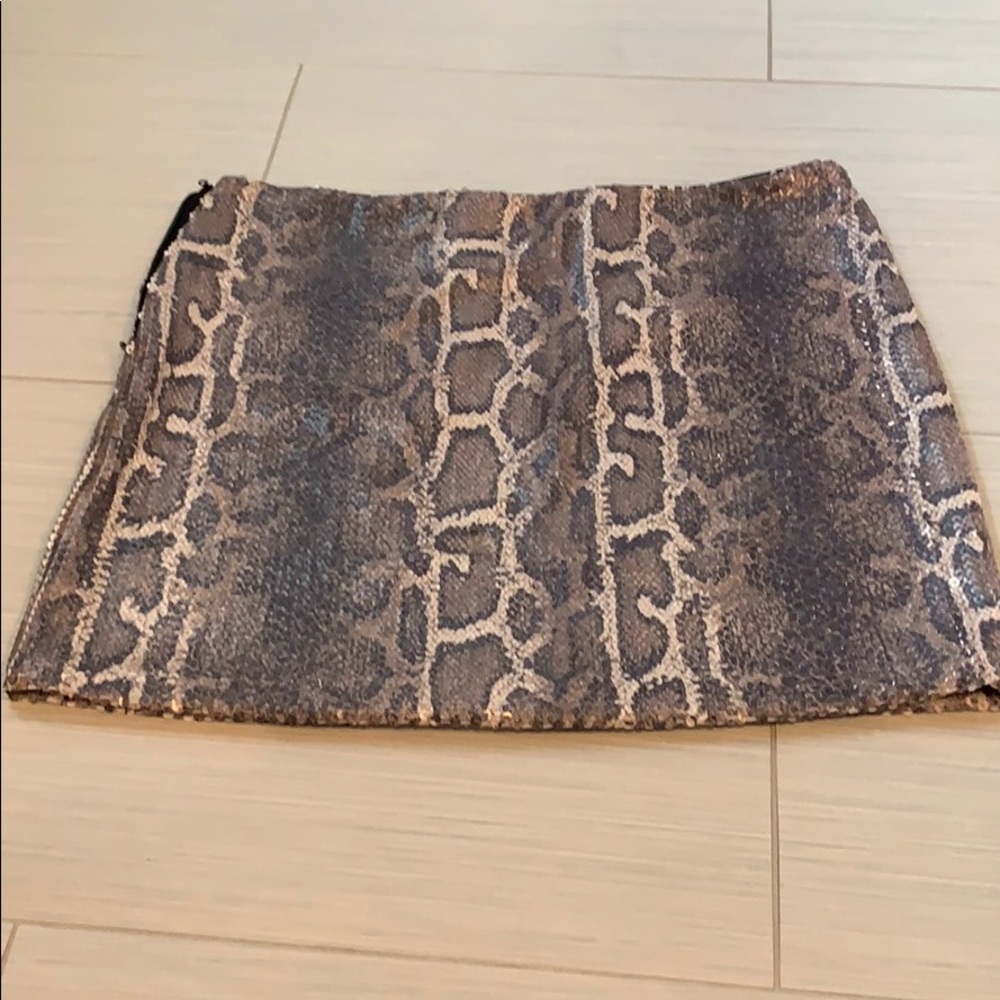 Snakeskin sequin mini skirt by Bebe